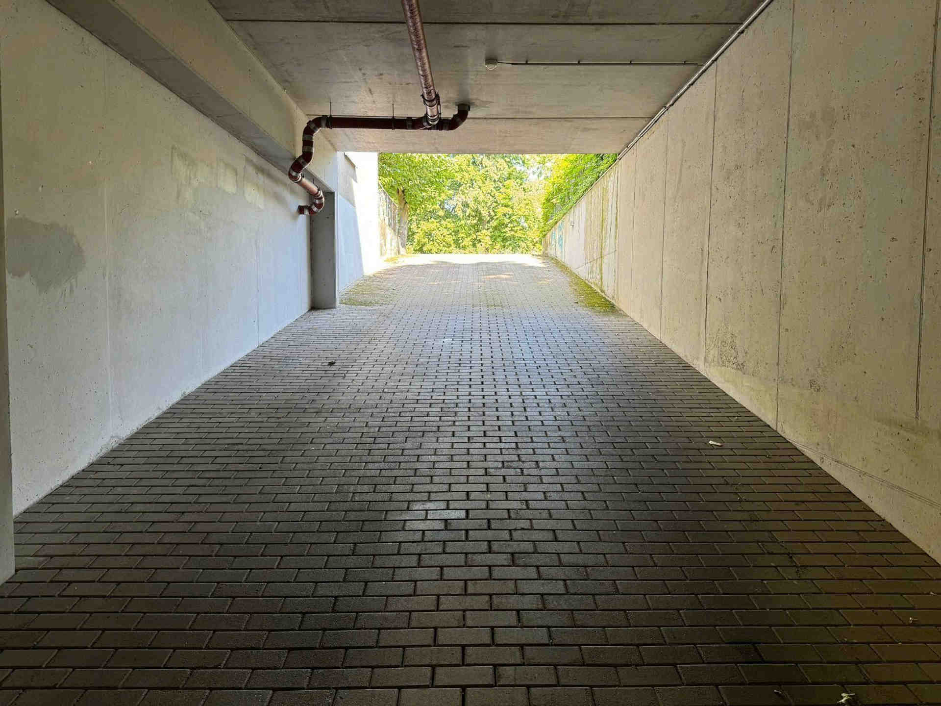 Underground Parking Garage with Two-Level Car Lift System - Tauernallee, 12107 Berlin - Photo 2 of 5